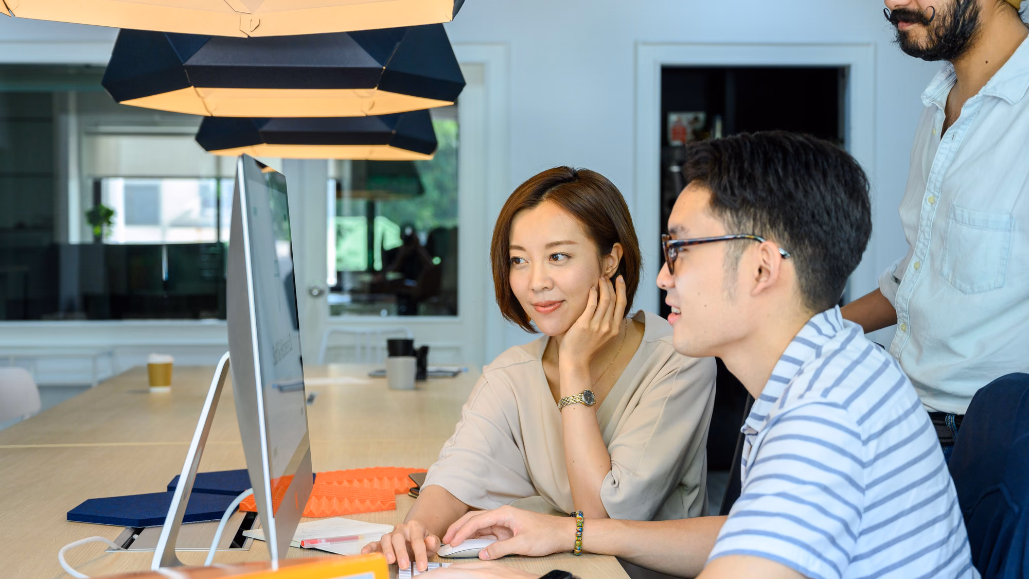 Engineers reviewing an Angular module architecture together.